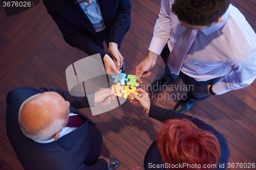 Image of assembling jigsaw puzzle