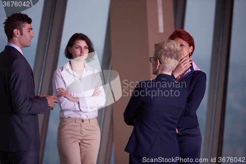 Image of business people group on meeting at modern bright office