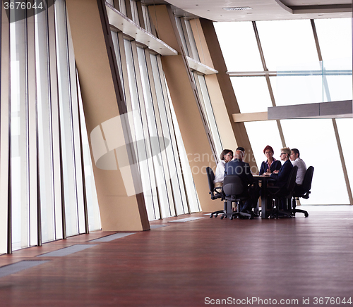 Image of business people group on meeting at modern bright office