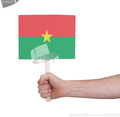 Image of Hand holding small card - Flag of Burkina Faso