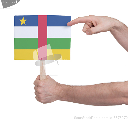 Image of Hand holding small card - Flag of Central African Republic