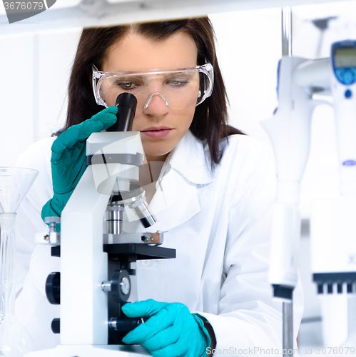 Image of Young chemist in the laboratory.