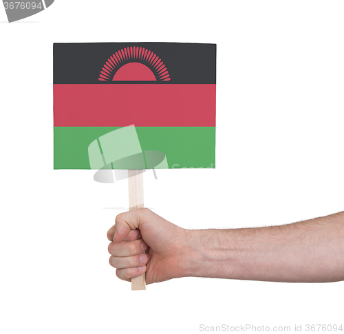 Image of Hand holding small card - Flag of Malawi