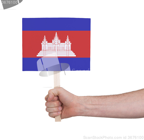 Image of Hand holding small card - Flag of Cambodia