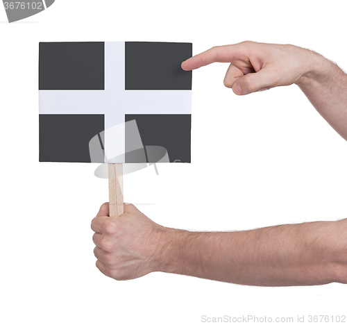 Image of Hand holding small card - Flag of Cornwall