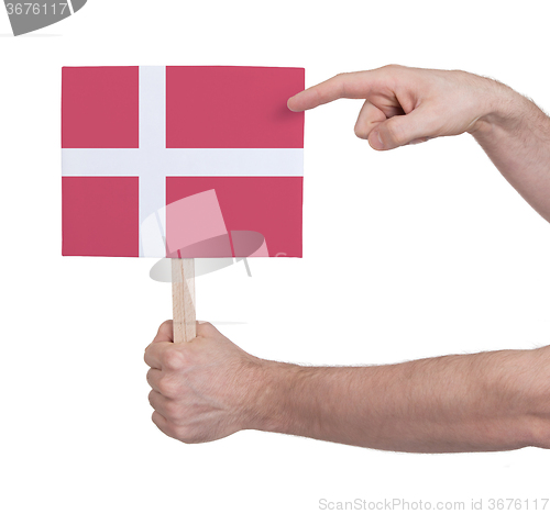 Image of Hand holding small card - Flag of Denmark