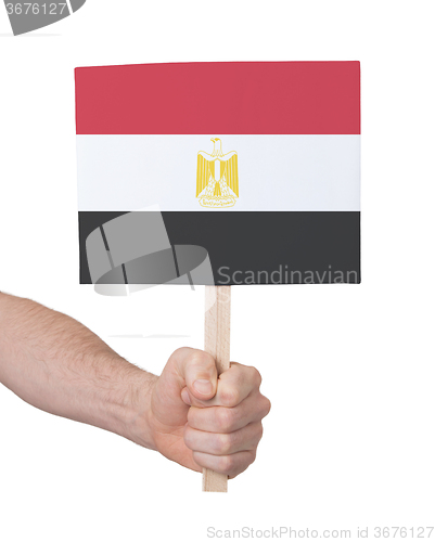 Image of Hand holding small card - Flag of Egypt