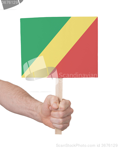 Image of Hand holding small card - Flag of Congo