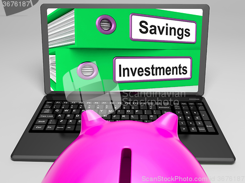 Image of Savings And Investments Files On Laptop Showing Finances