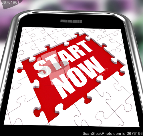 Image of Start Now Smartphone Shows Commence Or Begin Immediately