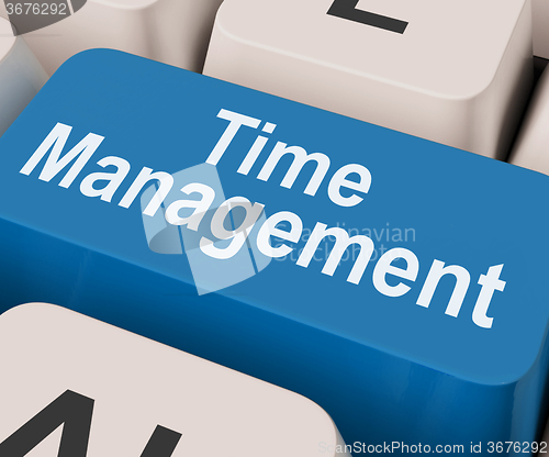 Image of Time Management Key Shows Organizing Schedule Online