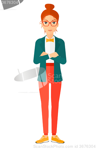Image of Woman standing with crossed arms.