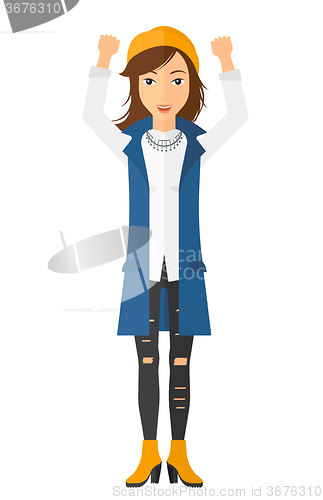 Image of Woman with raised hands up.