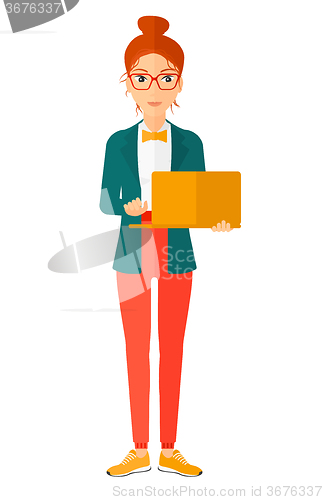 Image of Woman using laptop.