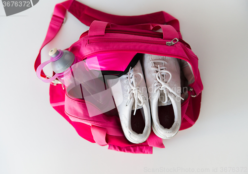 Image of close up of female sports stuff in backpack