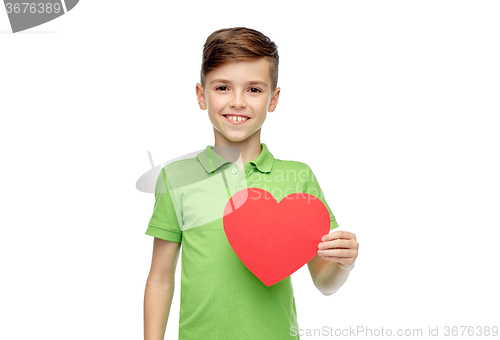 Image of happy boy holding red heart shape