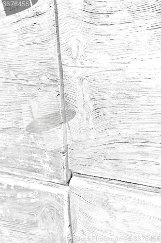 Image of grain  a brown  old door in italy   europe