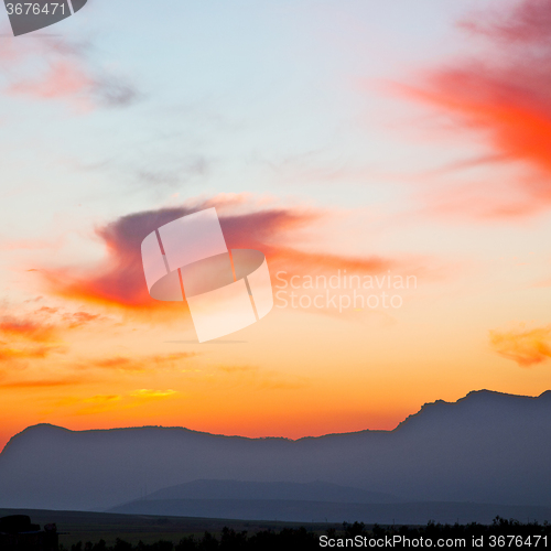 Image of mountain in morocco africa lans and red sunrise