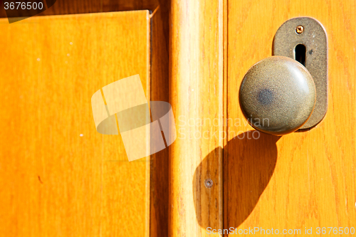 Image of stripped paint  door    in italy    traditional  texture nail