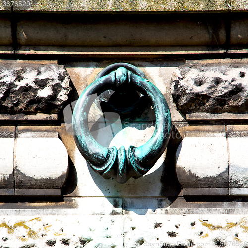 Image of blue   handle in london antique concrete  rusty  brass nail and 