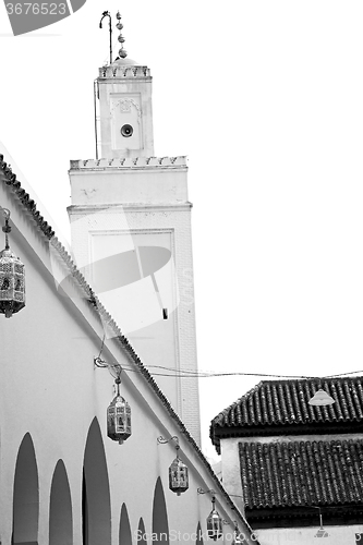 Image of old   brick tower in morocco africa village and the sky