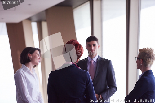 Image of business people group on meeting at modern bright office
