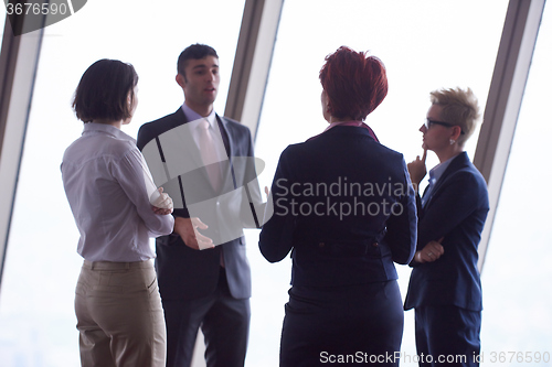 Image of business people group on meeting at modern bright office