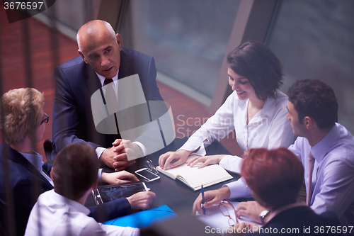 Image of business people group on meeting at modern bright office