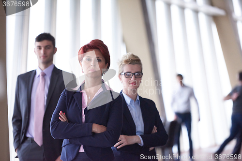 Image of diverse business people group with redhair  woman in front