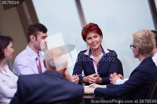 Image of business people group on meeting at modern bright office