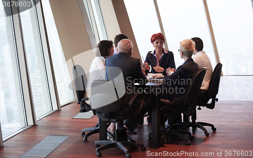 Image of business people group on meeting at modern bright office