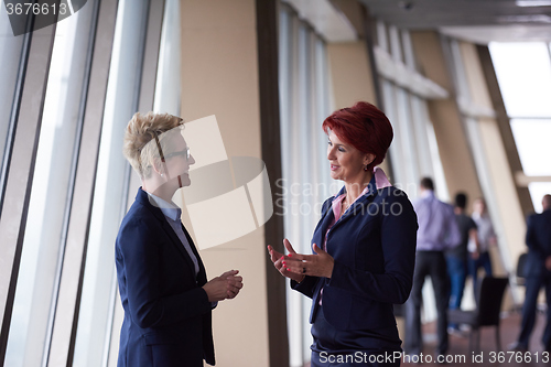 Image of business woman goup at modern bright office