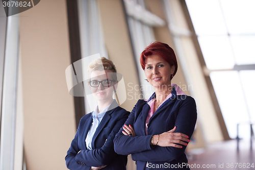 Image of business woman goup at modern bright office
