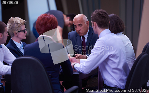 Image of business people group on meeting at modern bright office