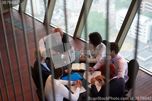 Image of business people group on meeting at modern bright office