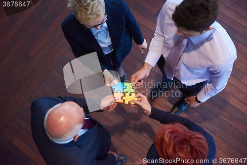 Image of assembling jigsaw puzzle