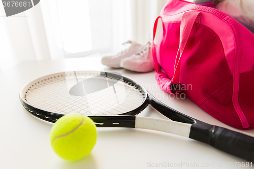 Image of close up of tennis stuff and female sports bag