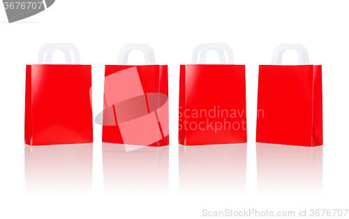 Image of many blank red shopping bags