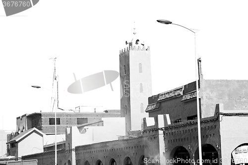 Image of old brick tower in morocco africa village and the sky