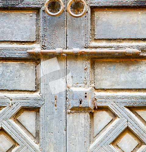 Image of rusty  brown    morocco in africa the old wood  facade home and 