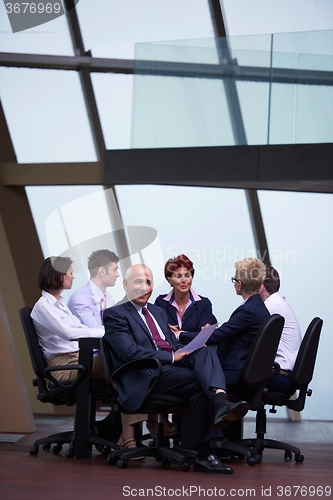 Image of business people group on meeting at modern bright office