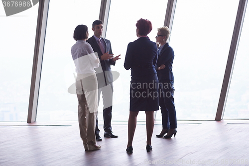 Image of business people group on meeting at modern bright office