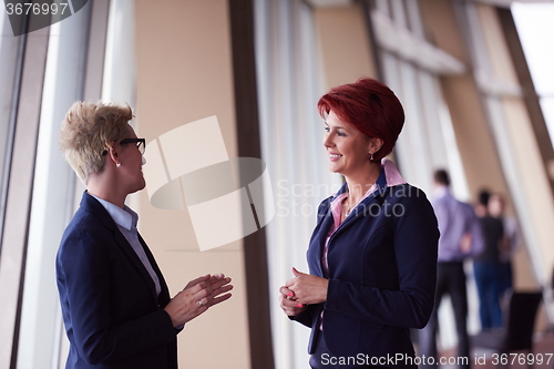 Image of business woman goup at modern bright office