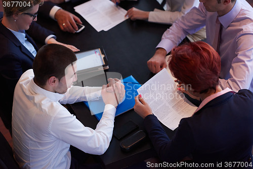 Image of business people group on meeting at modern bright office