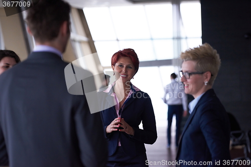 Image of business people group on meeting at modern bright office