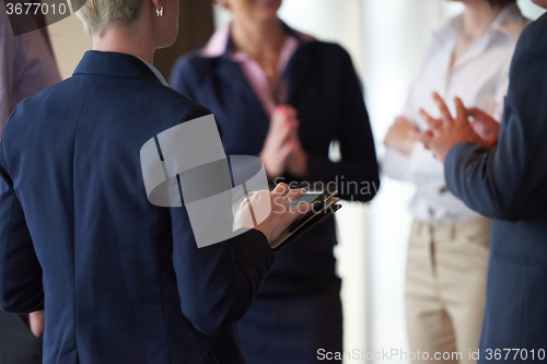 Image of business people group on meeting at modern bright office