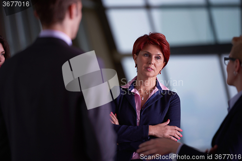 Image of business people group on meeting at modern bright office
