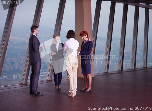 Image of business people group on meeting at modern bright office