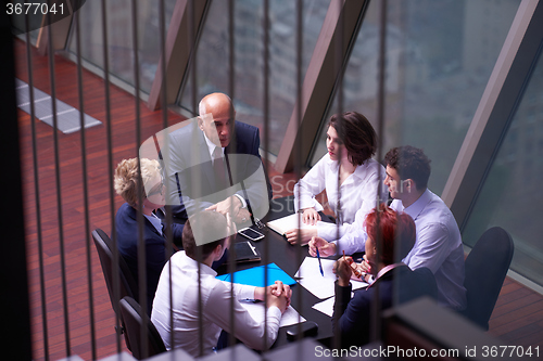 Image of business people group on meeting at modern bright office