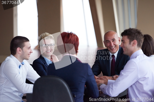 Image of business people group on meeting at modern bright office